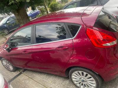 FORD MODEL FIESTA TITANIUM 96  ENGINE SIZE 1.4 Litres FUEL PETROL BODY 5 DOOR HATCHBACK TRANSMISSION MANUAL SEATS 5 COLOUR RED REG DATE 31/07/2010 Mileage: 55400 LO10HDK